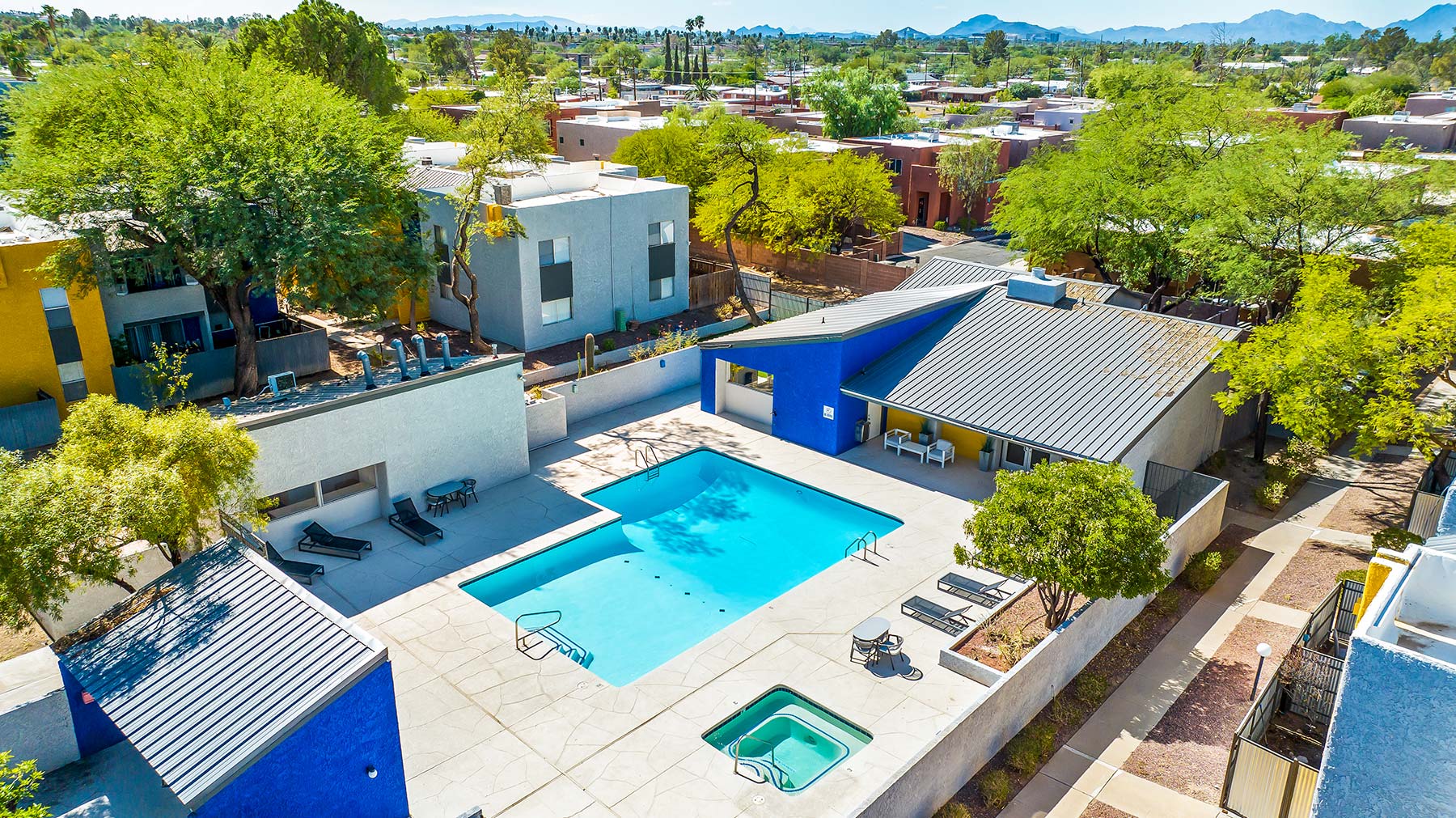 Aerial view of the swimming pool and surrounding community.